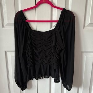 Women’s black sheer blouse